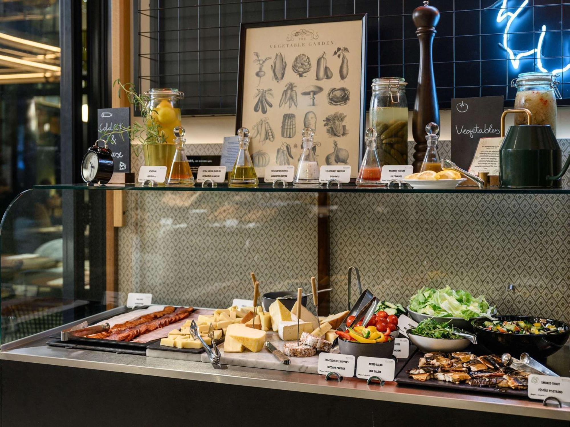 Pullman Budapest Exterior photo A cheese counter at a restaurant