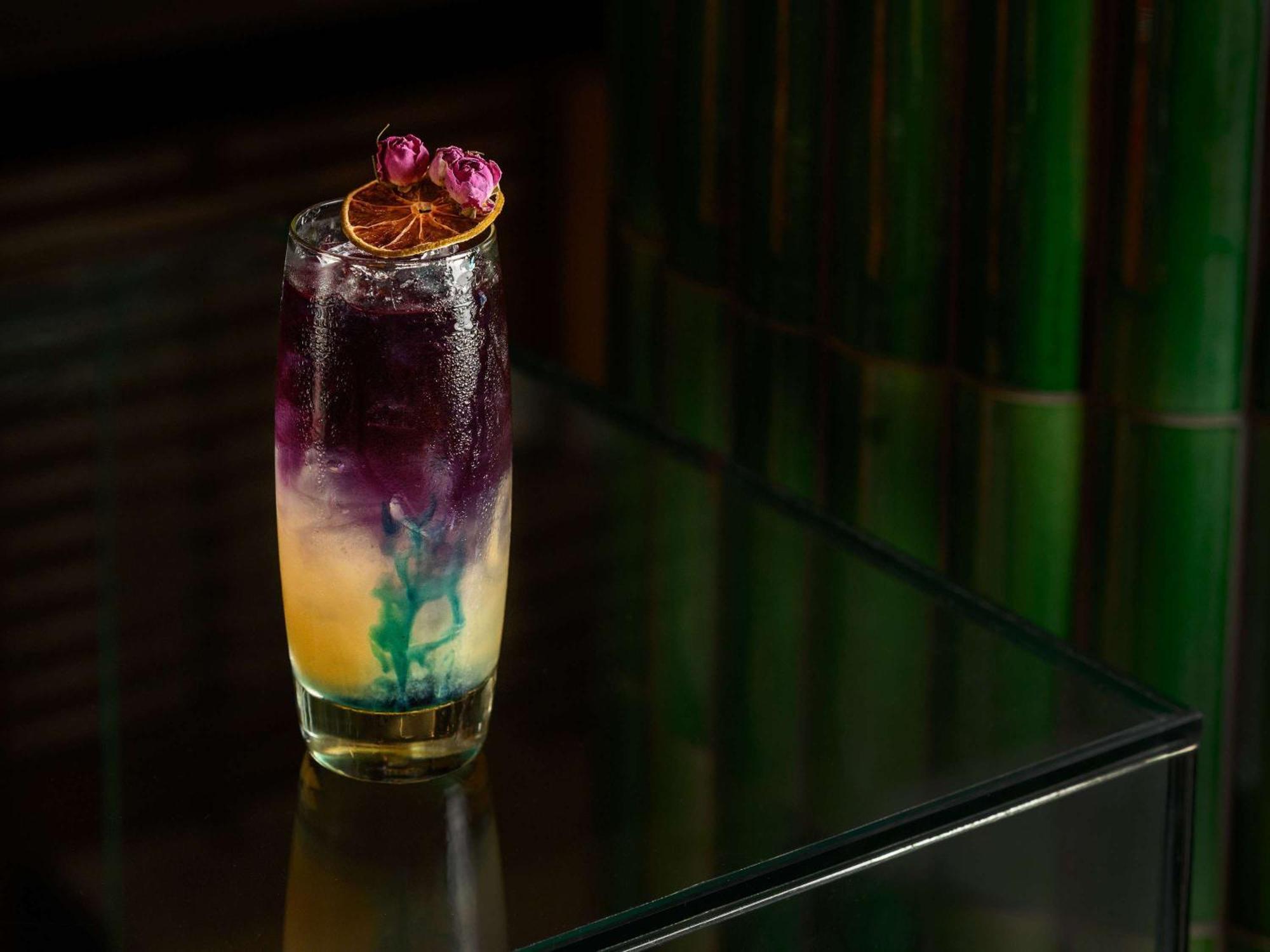Pullman Budapest Exterior photo A purple rain cocktail